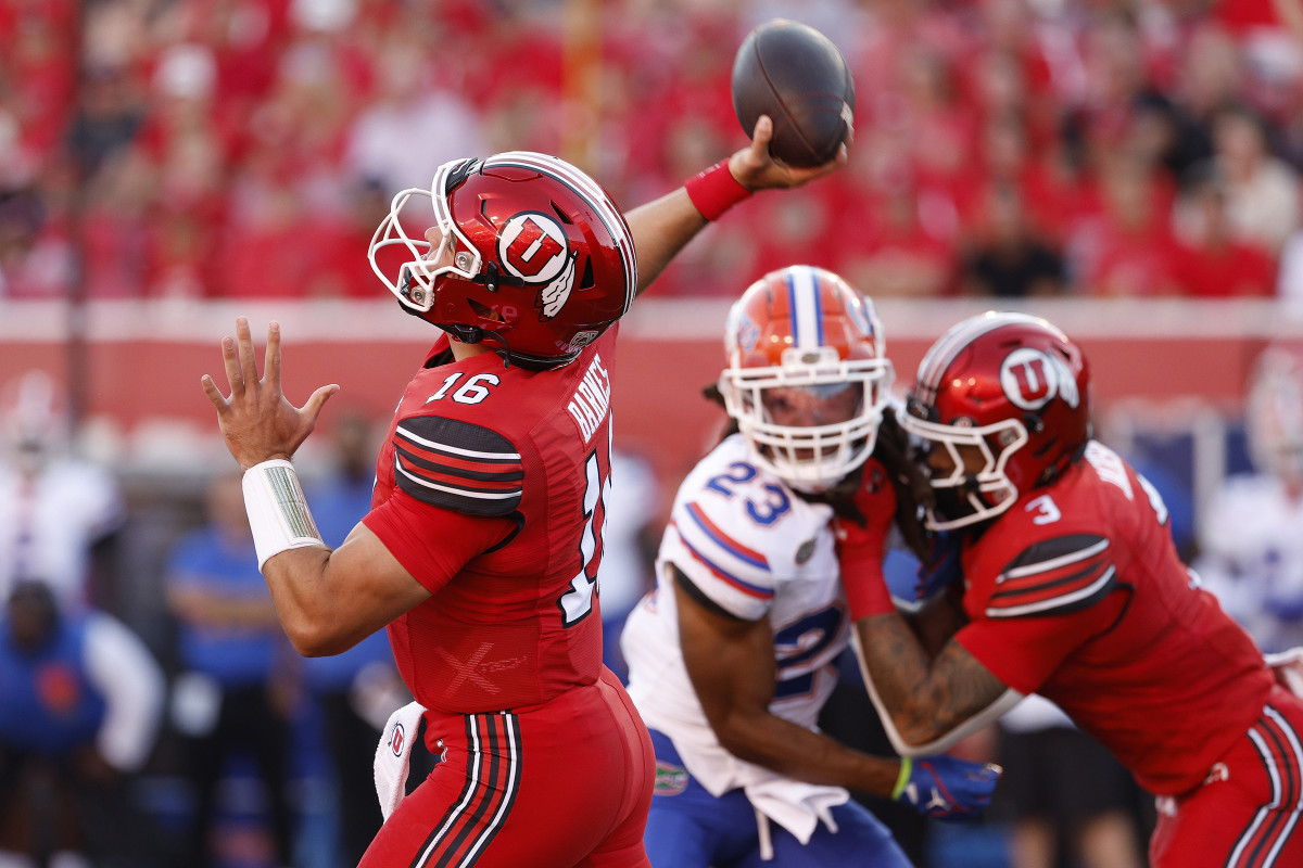 Aug 31, 2023; Salt Lake City, Utah, USA; Utah Utes quarterback Bryson Barnes (16) throws for a first half touchdown against the Florida Gators at Rice-Eccles Stadium. Mandatory Credit: Jeff Swinger-USA TODAY Sports
